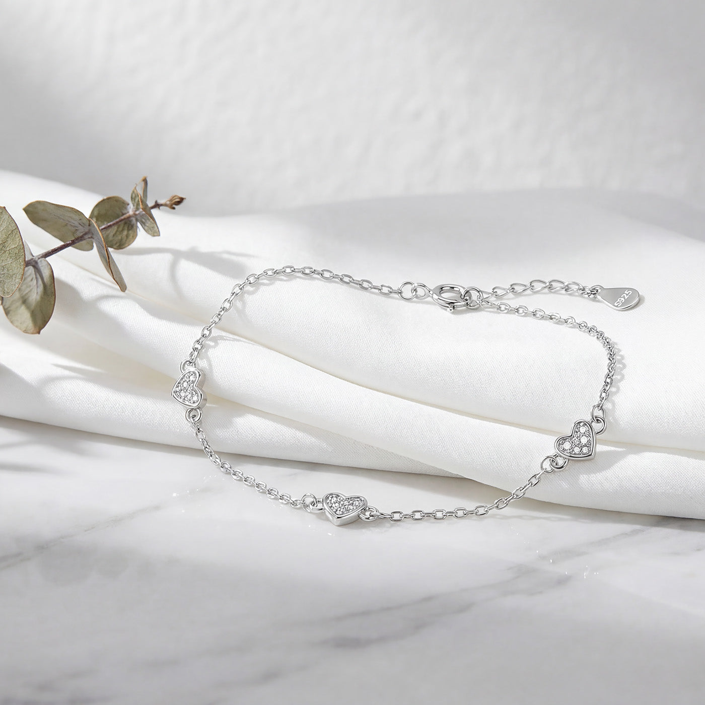 Sterling Silver Rhodium Plated Triple Heart Bracelet