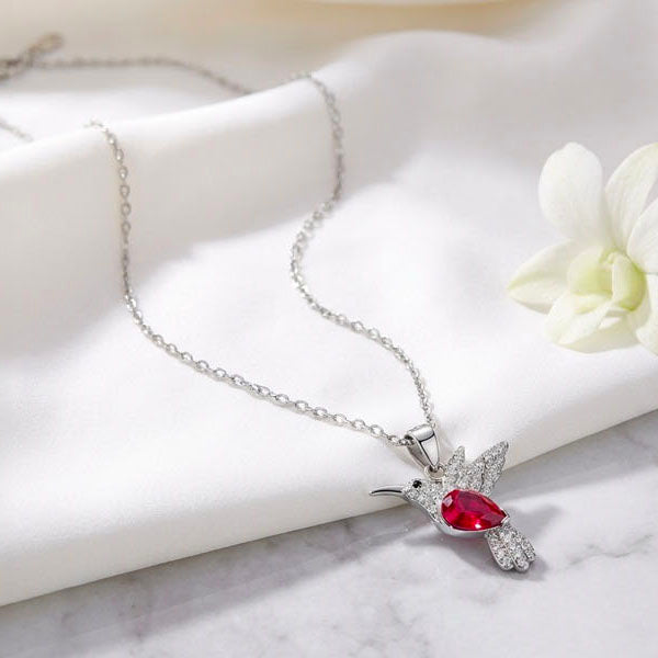Rhodium Plated Sterling Silver Hummingbird Necklace with Red CZ Stone