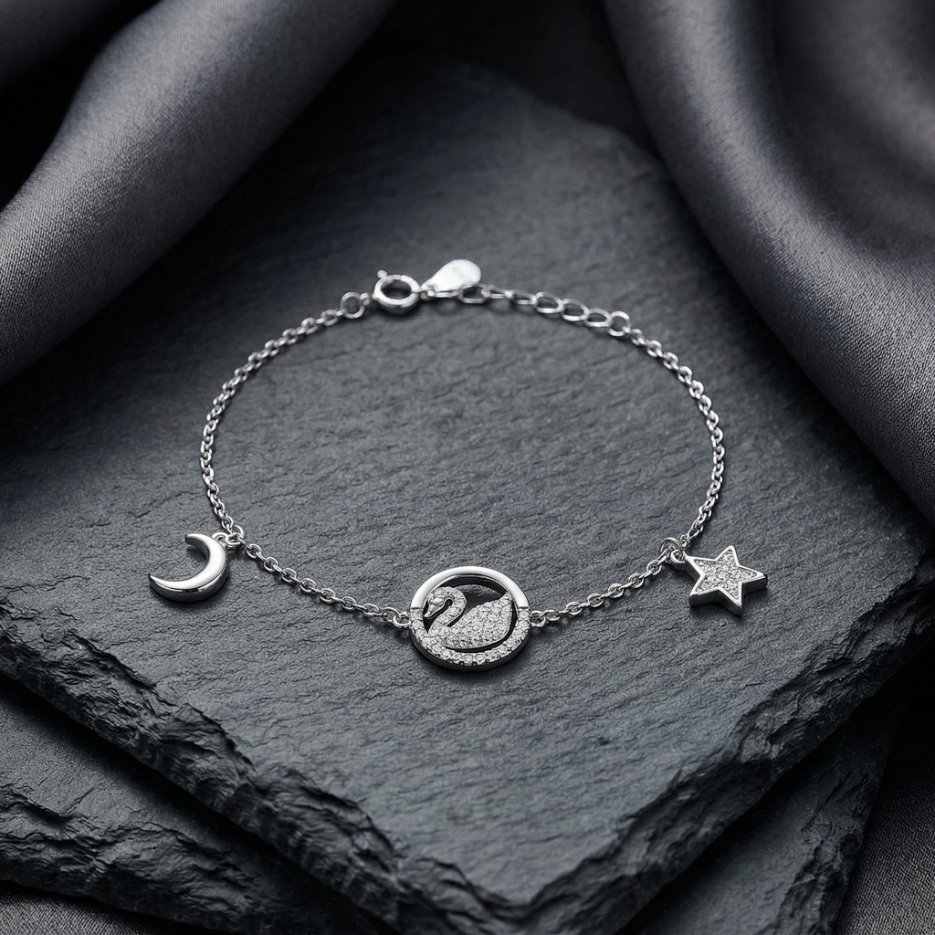 Rhodium Plated 925 Sterling Silver Swan Bracelet with Moon and Stars